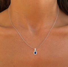 Pendentif en Or blanc 9k assemblé de Topaze blanche et Saphir bleu - Maison Di Giorgio